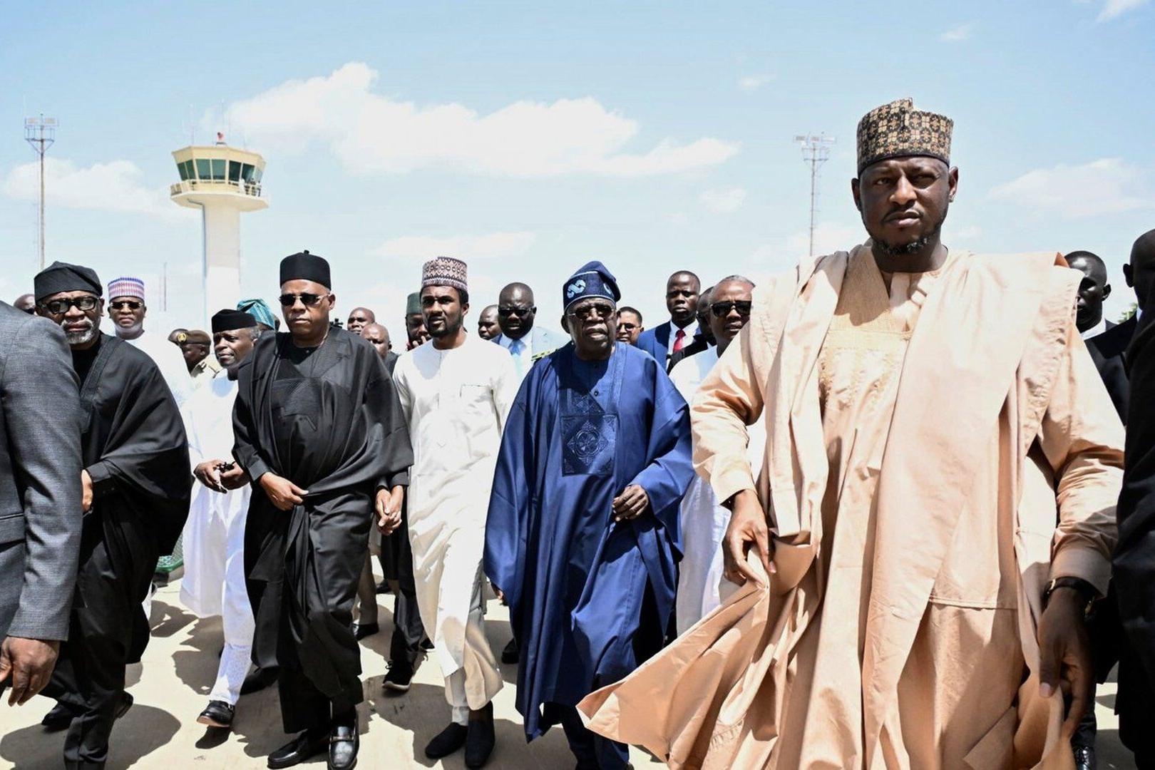 Former Nigerian president Buhari is buried as thousands pay respects